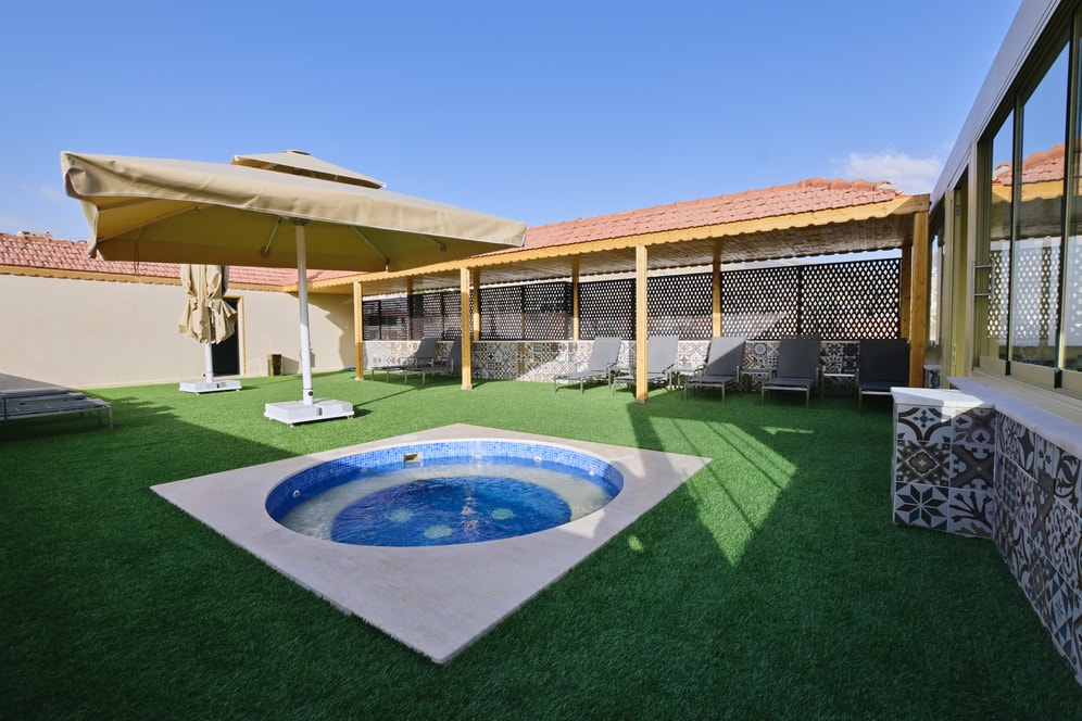 Petra Breeze Jacuzzi terrace with shaded seating