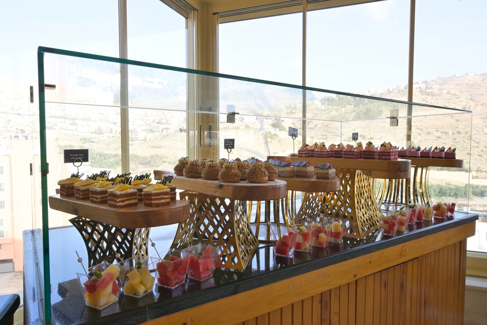 Dessert and fruit display at Petra Breeze Restaurant