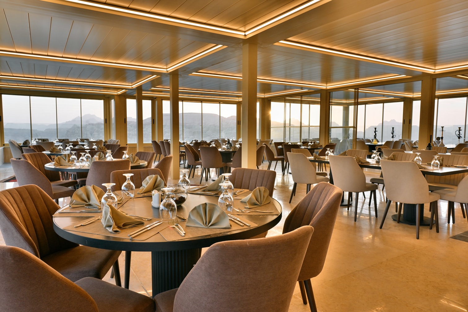 Elegant Petra Breeze Restaurant dining room with panoramic windows