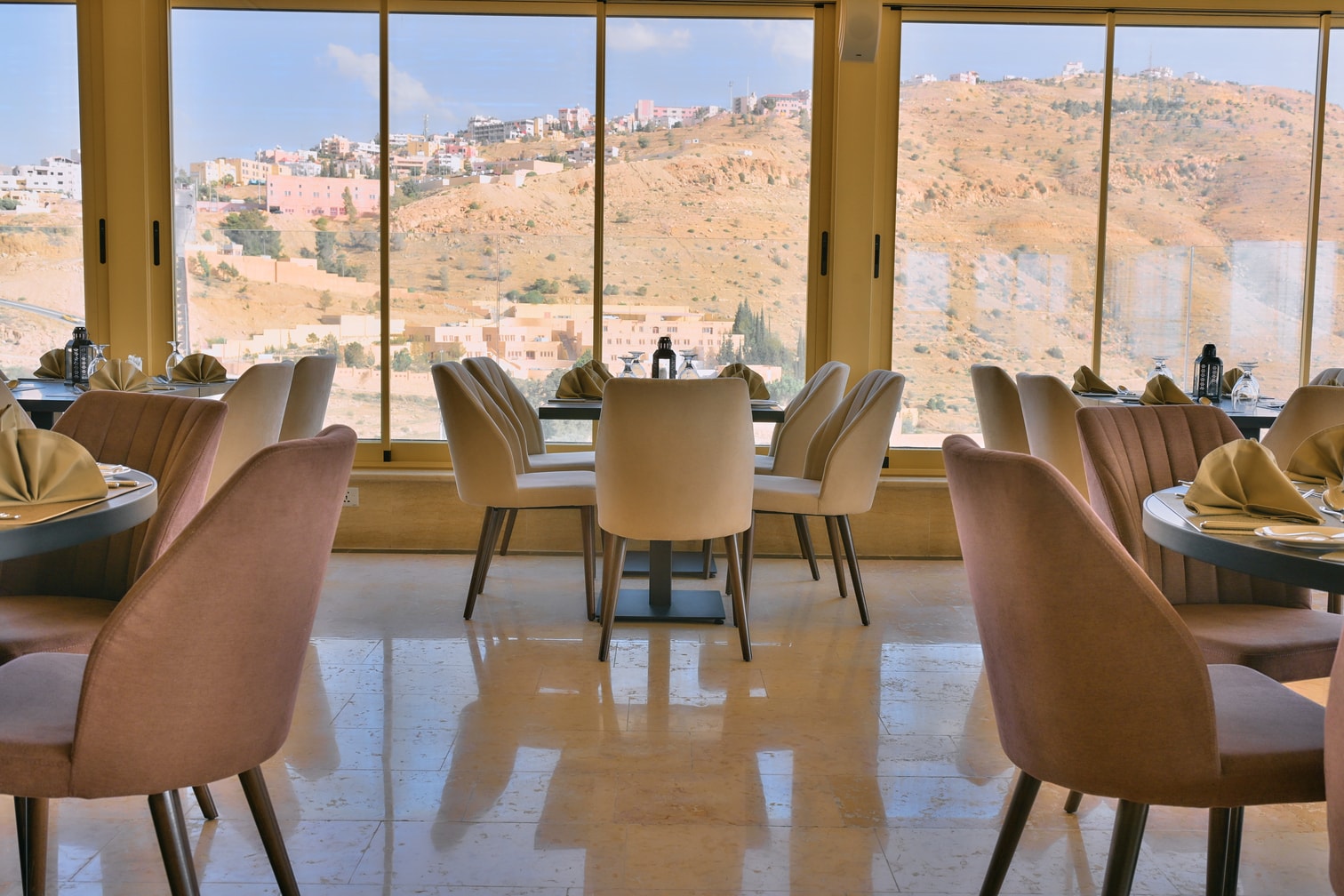 Petra Breeze Restaurant dining tables overlooking Wadi Musa
