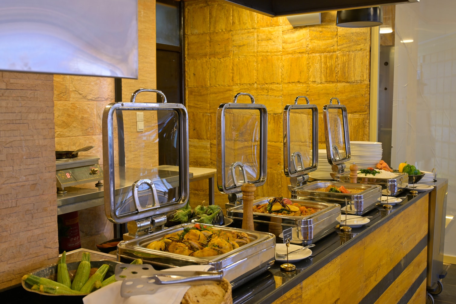 Petra Breeze Restaurant buffet service with freshly prepared dishes