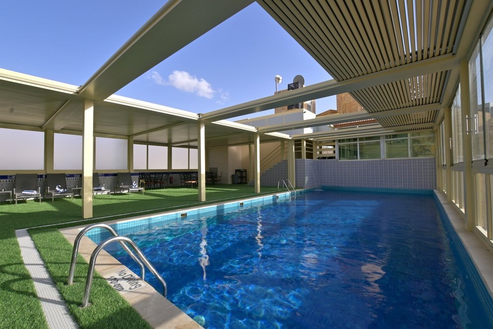 Covered Petra Breeze Pool with relaxing lounge area